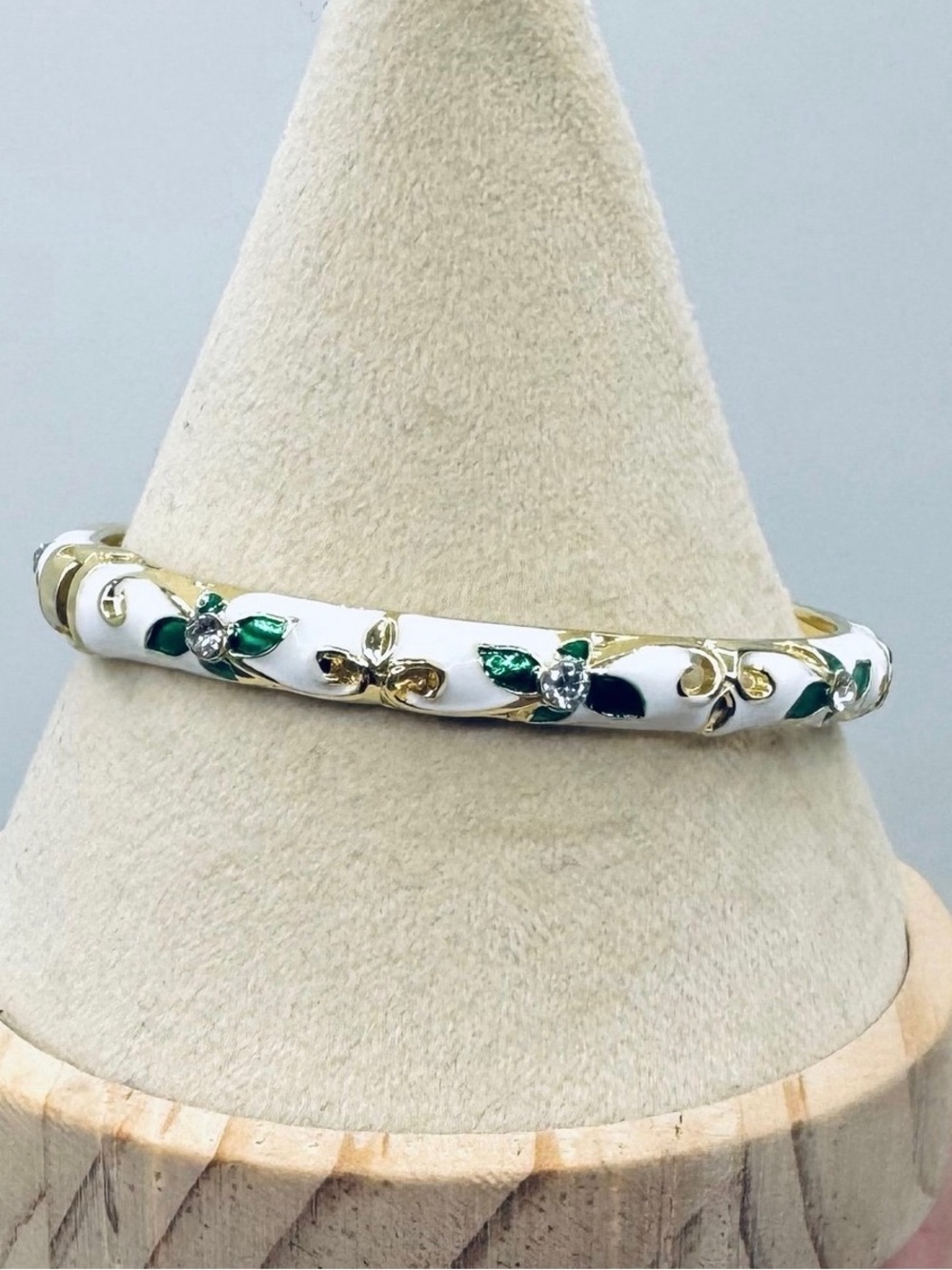 Gold-Tone White Enamel Bracelet with Green Accent Leaves
